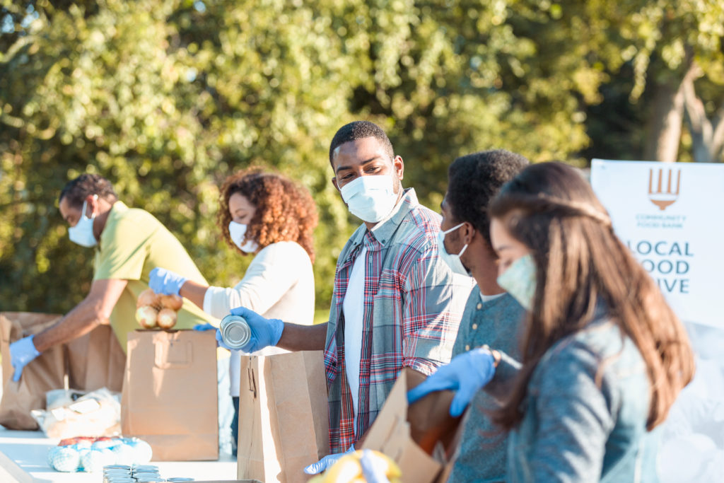 Community food bank volunteers working during COVID-19 crisis